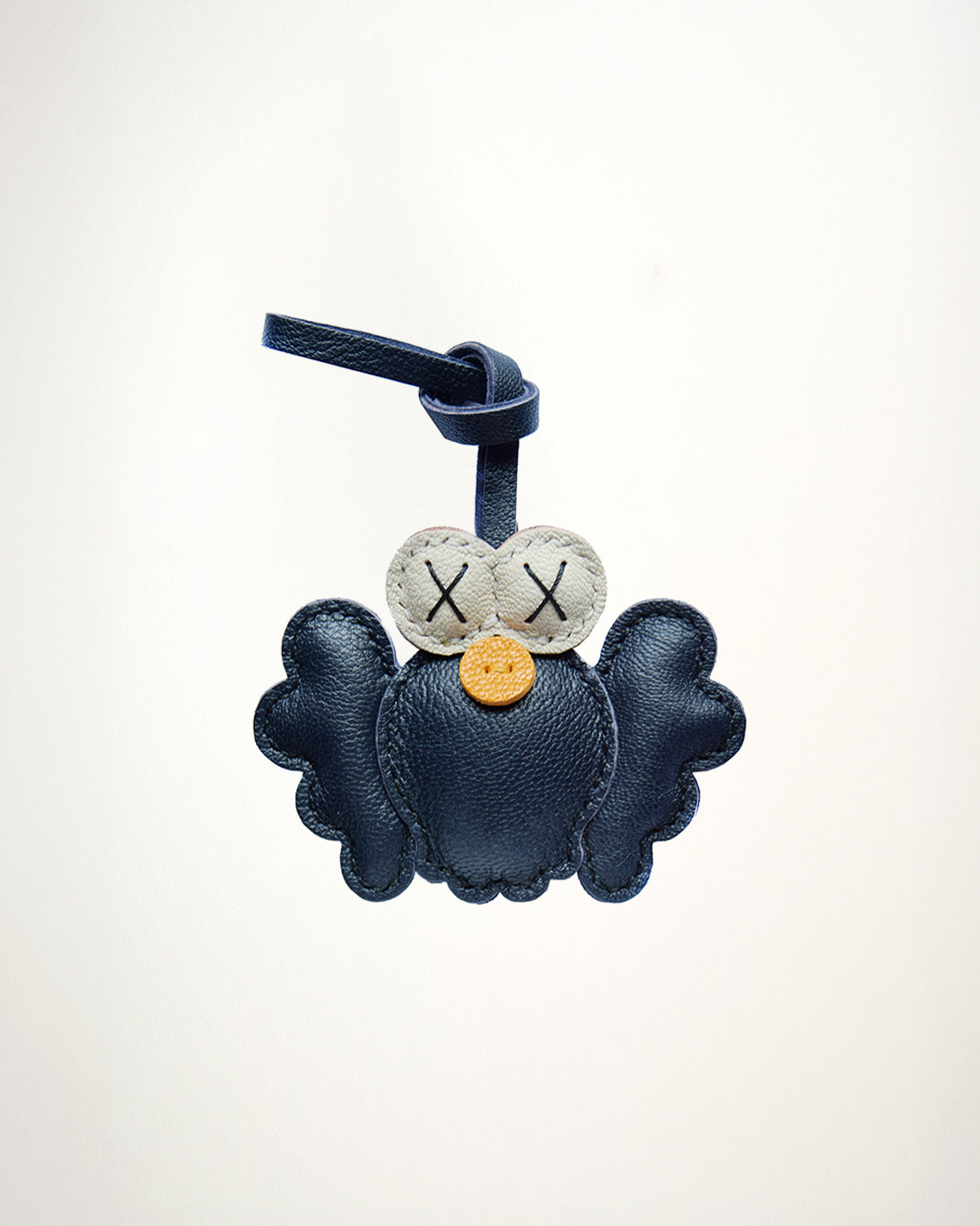 Mochi Manner handmade full-grain leather – sheep skin blue owl bag charm with stitched eyes and gold-plated hardware