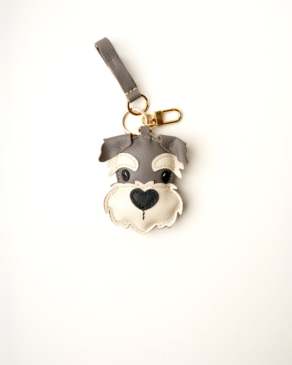 Mochi Manner handmade full-grain leather – sheep skin Schnauzer dog bag charm in grey, cream, and black with gold-plated hardware
